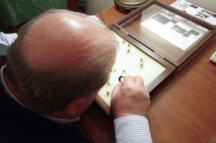 John Shaner with the magnifier John Shaner with the magnifier